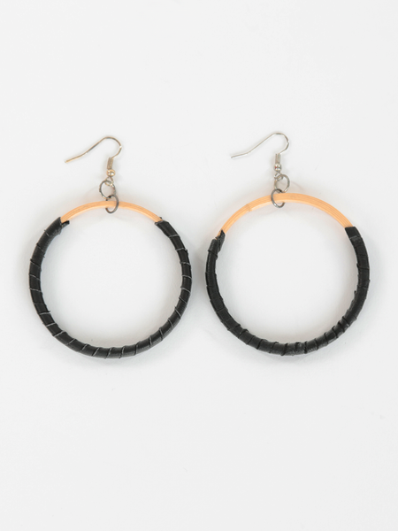 Black leather Hispaniola Hoop Earrings with individually crafted wooden circle centerpiece. Front view.