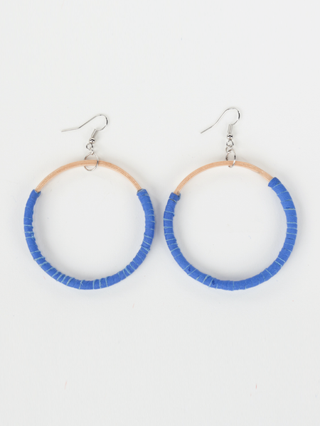 Royal blue leather Hispaniola Hoop Earrings with individually crafted wooden circle centerpiece. Front view.