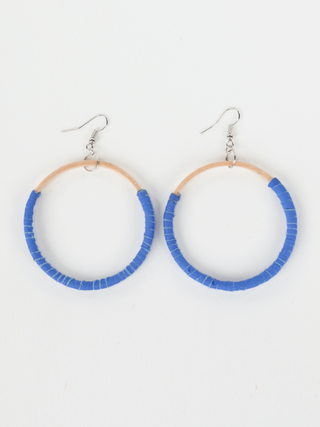 Royal blue leather Hispaniola Hoop Earrings with individually crafted wooden circle centerpiece. Front view. 