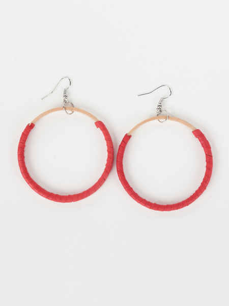 Red leather Hispaniola Hoop Earrings with individually crafted wooden circle centerpiece. Front view. 